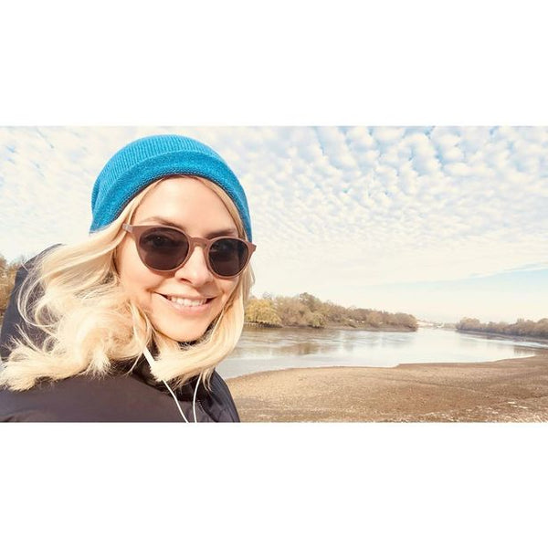 Holly Willoughby wearing sunglasses on UK beach